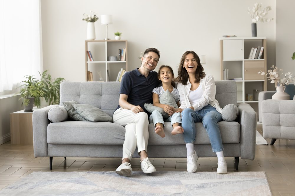 Family relaxing comfortably at home
